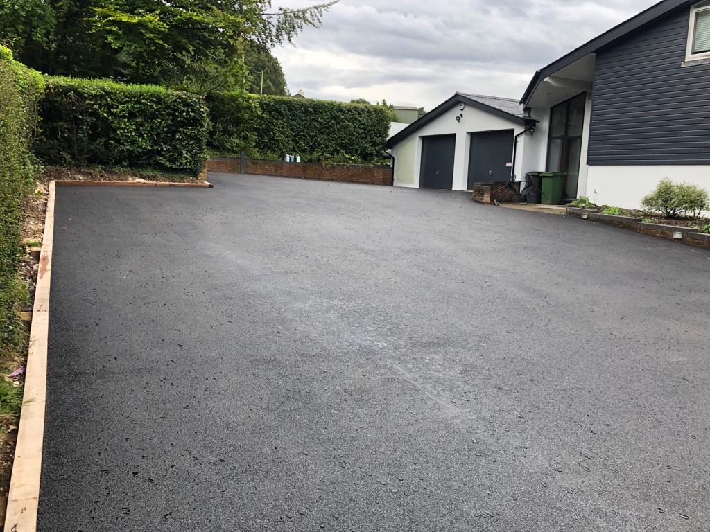 This is a photo of a asphalt driveway which is in the process of being installed by Sunbury Road Tech